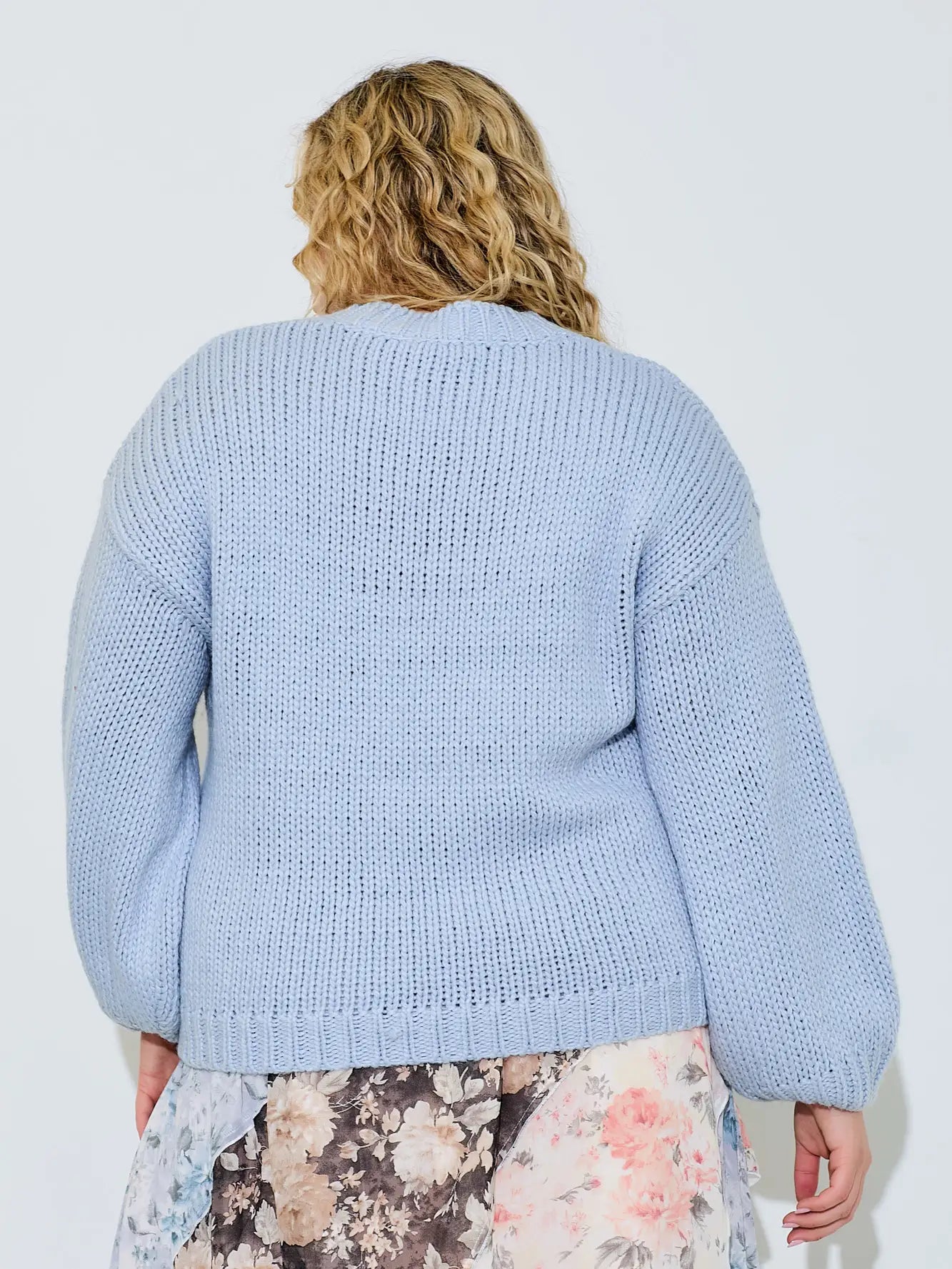 Blue Kylie knit sweater with boots