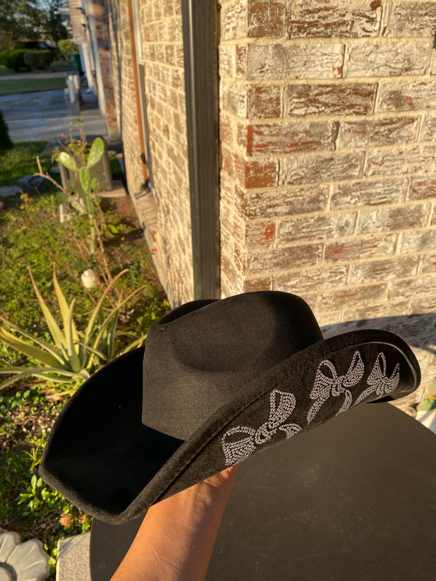 Cowgirl hat with rhinestone bows