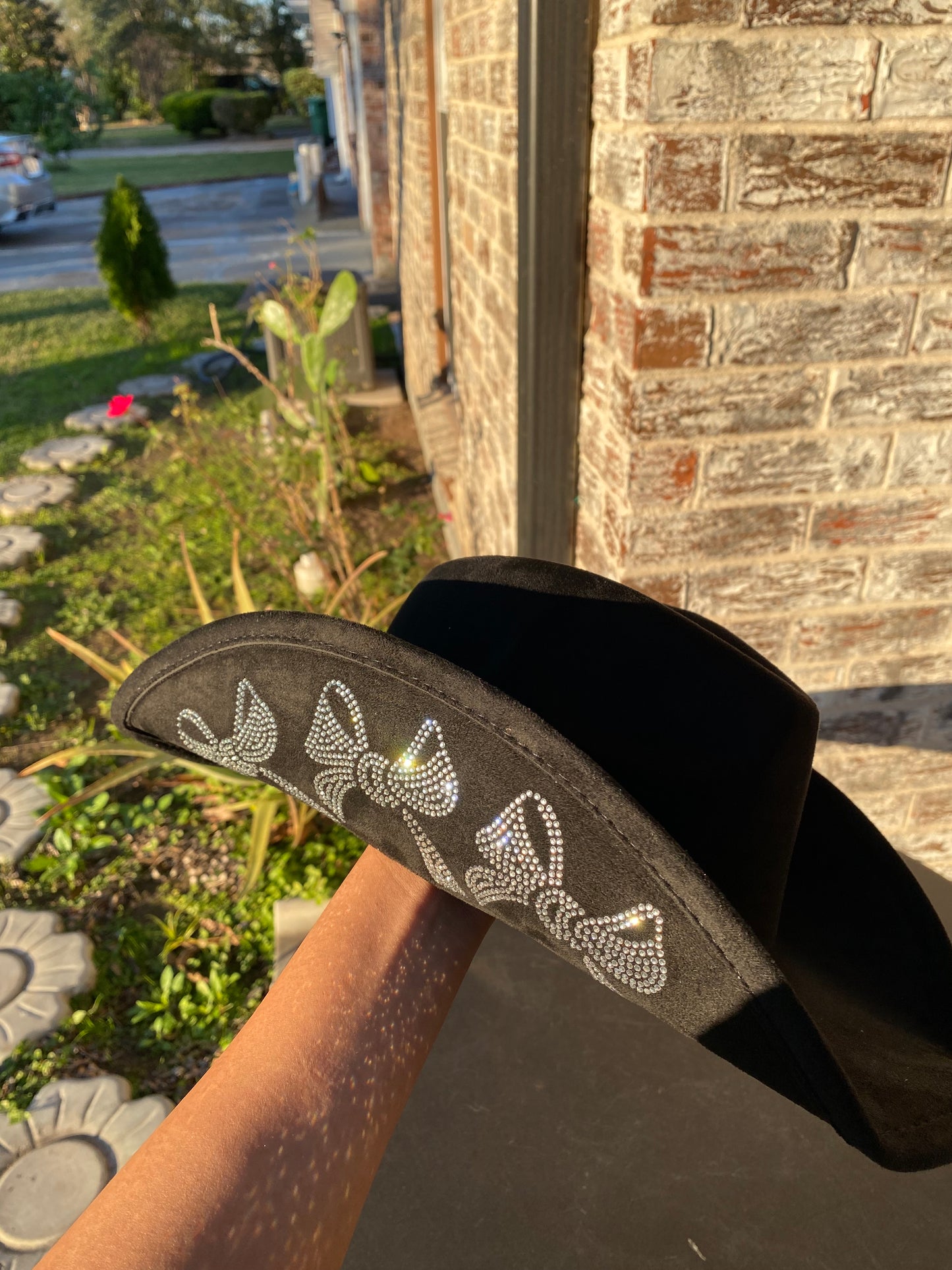 Cowgirl hat with rhinestone bows