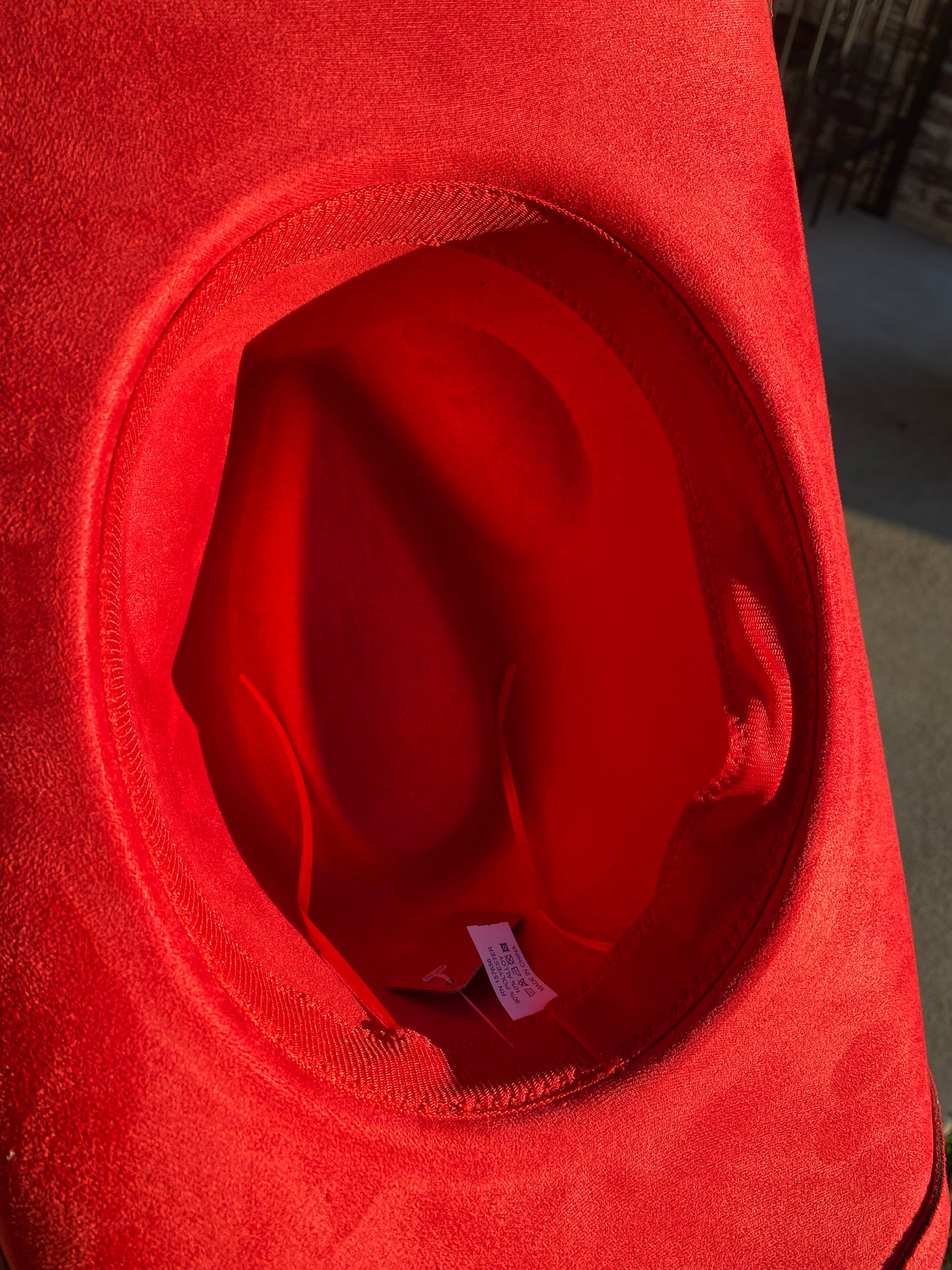 Red cowgirl hat with metallic hearts