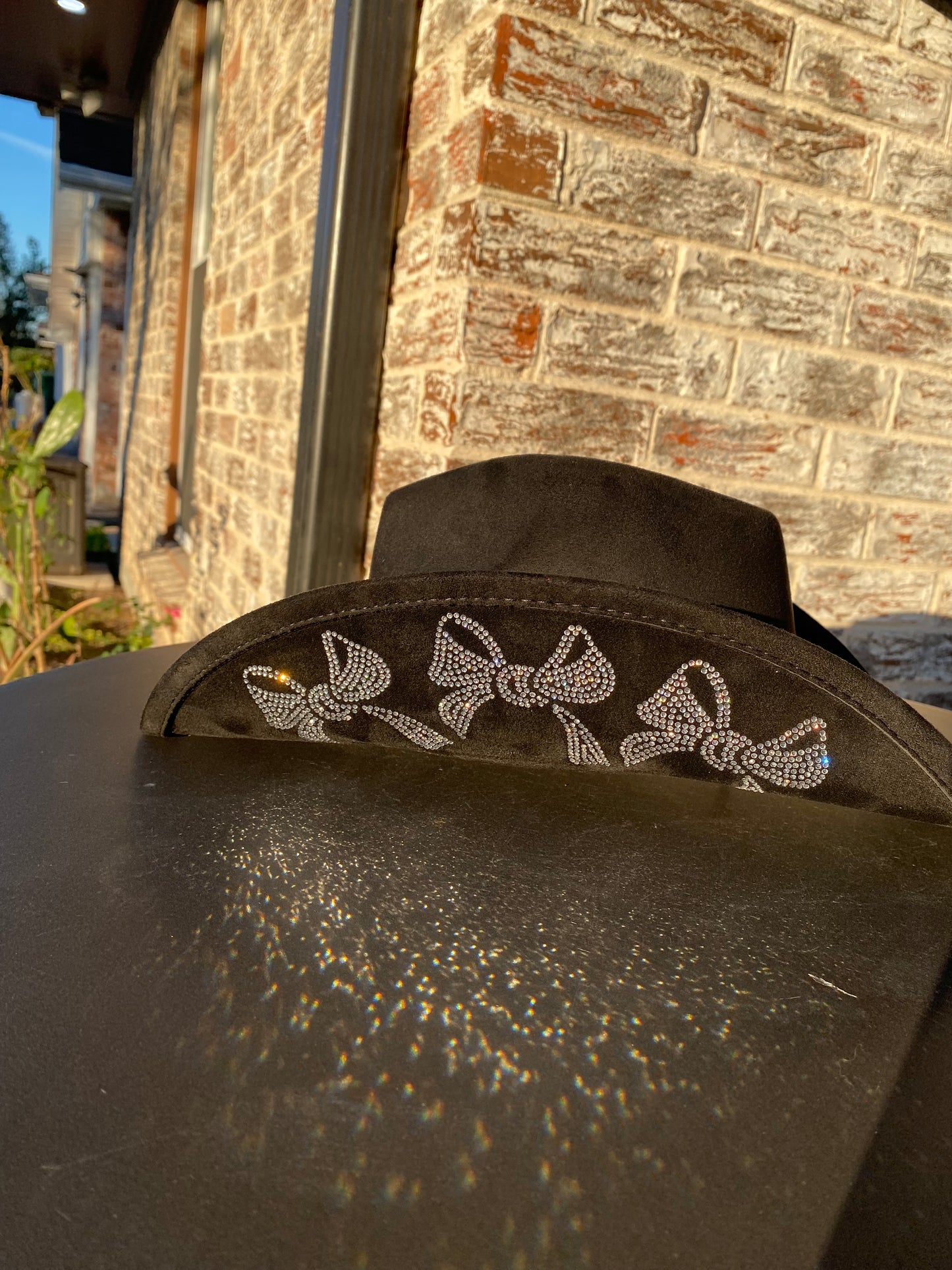 Cowgirl hat with rhinestone bows