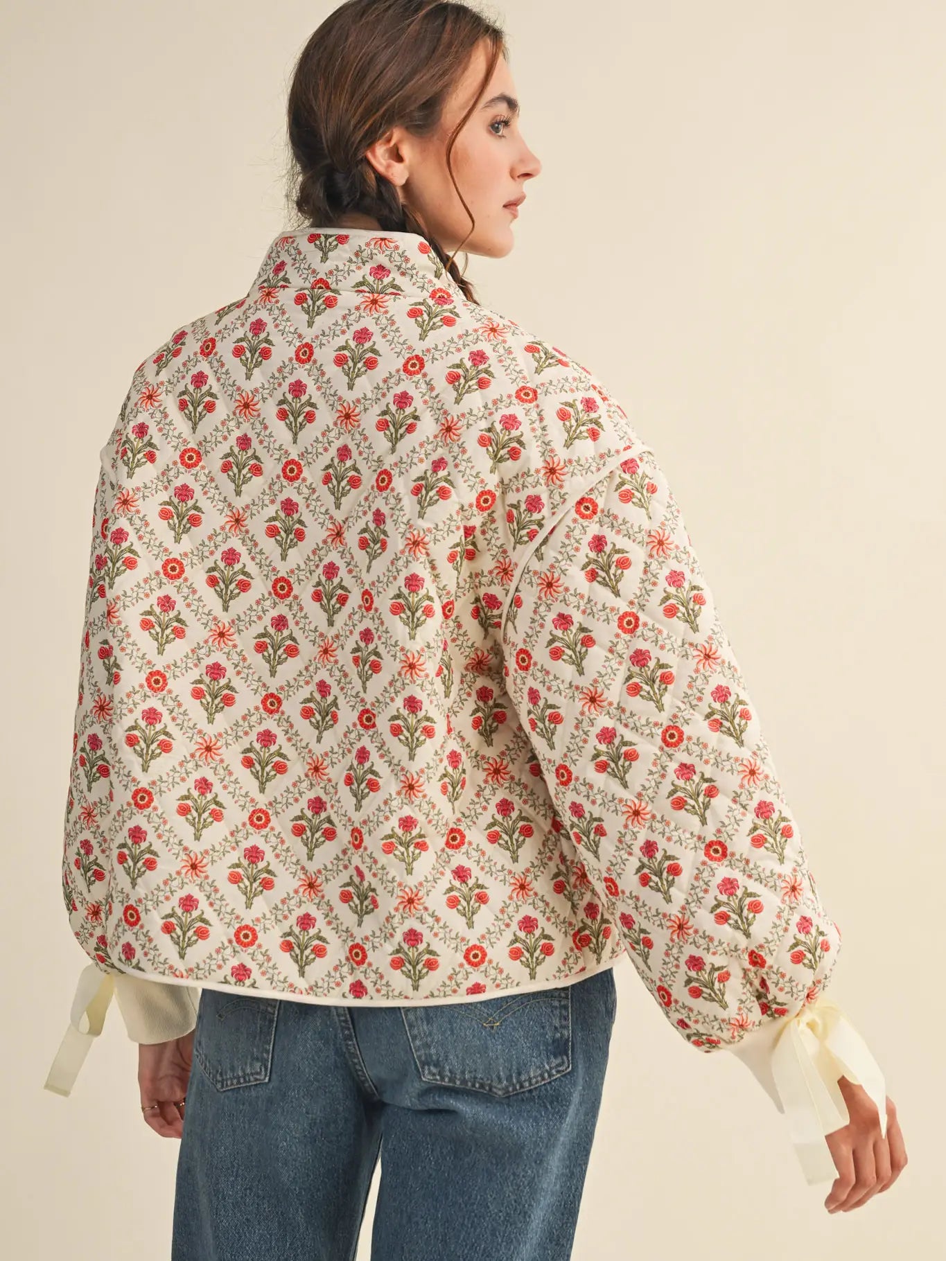 Floral quilted jacket with ribbon detail