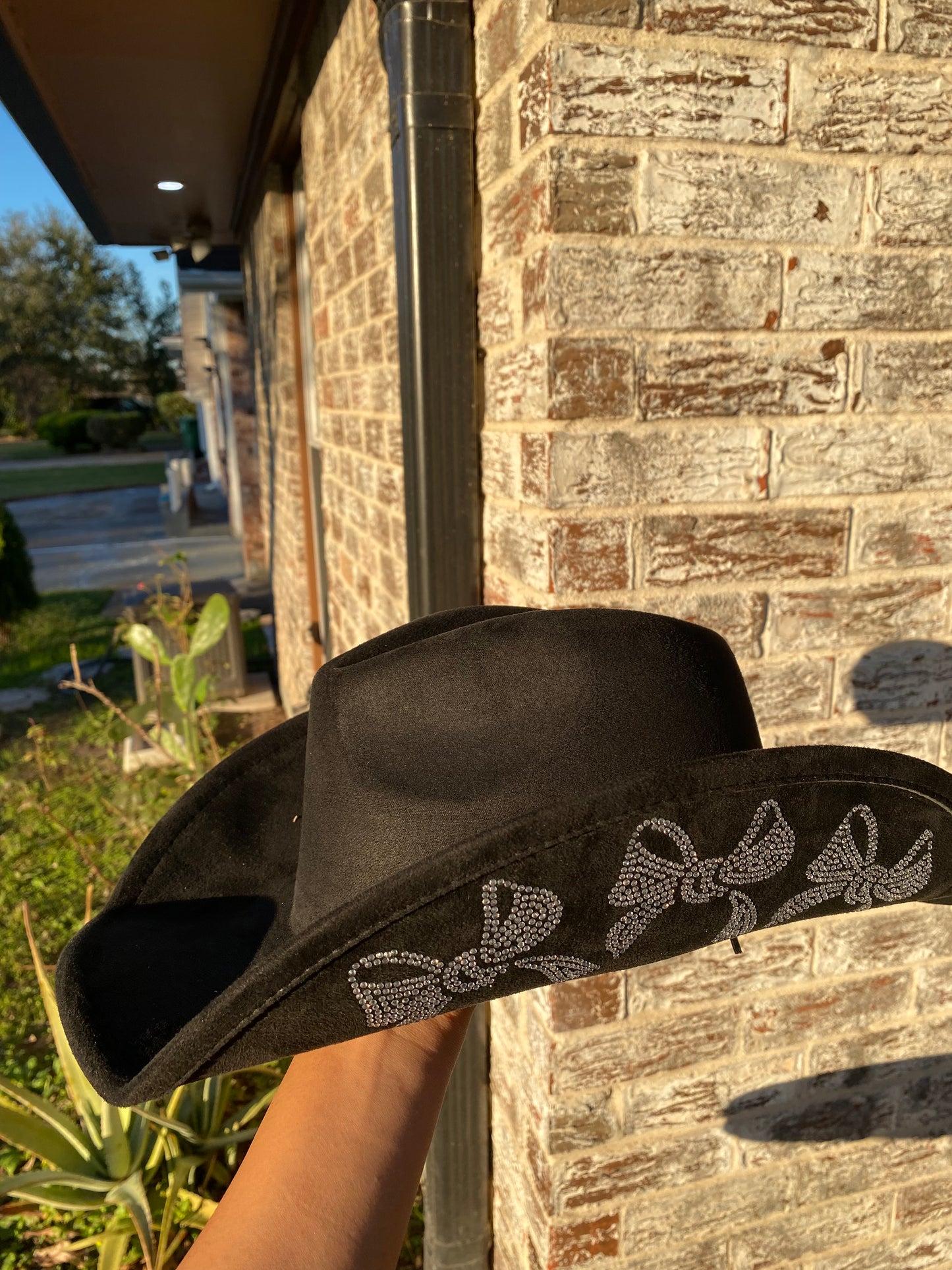 Cowgirl hat with rhinestone bows