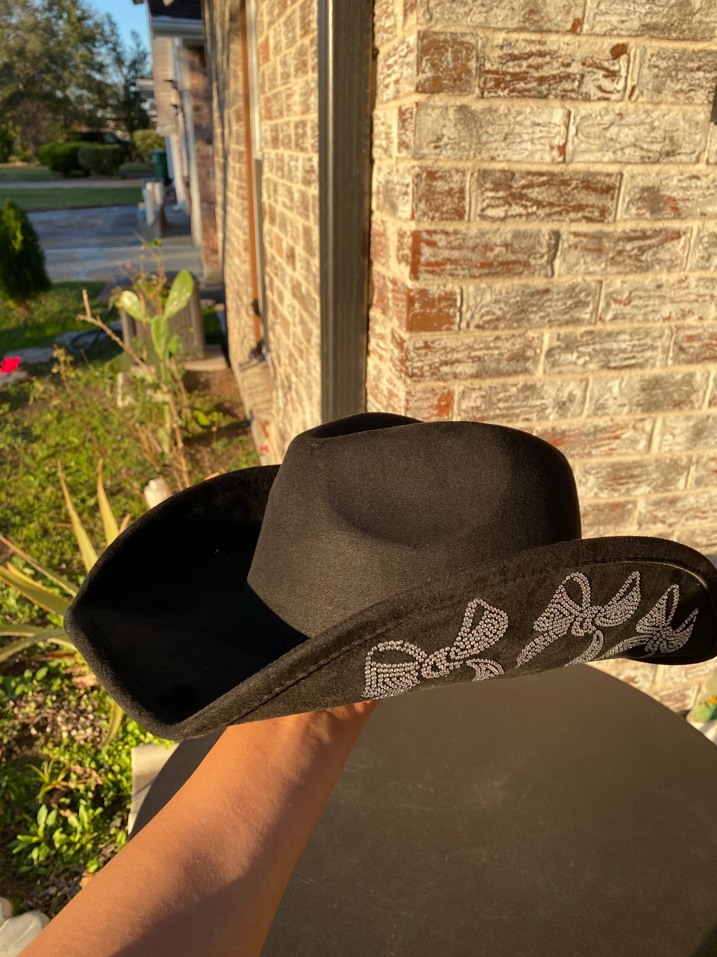 Cowgirl hat with rhinestone bows