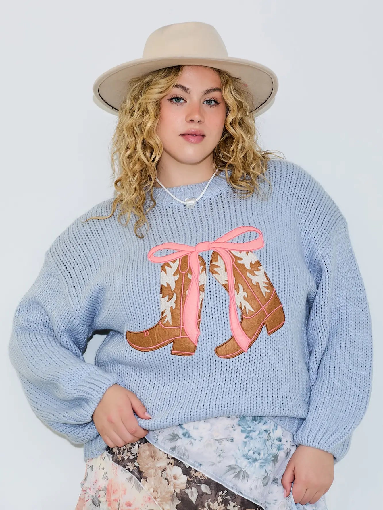 Blue Kylie knit sweater with boots